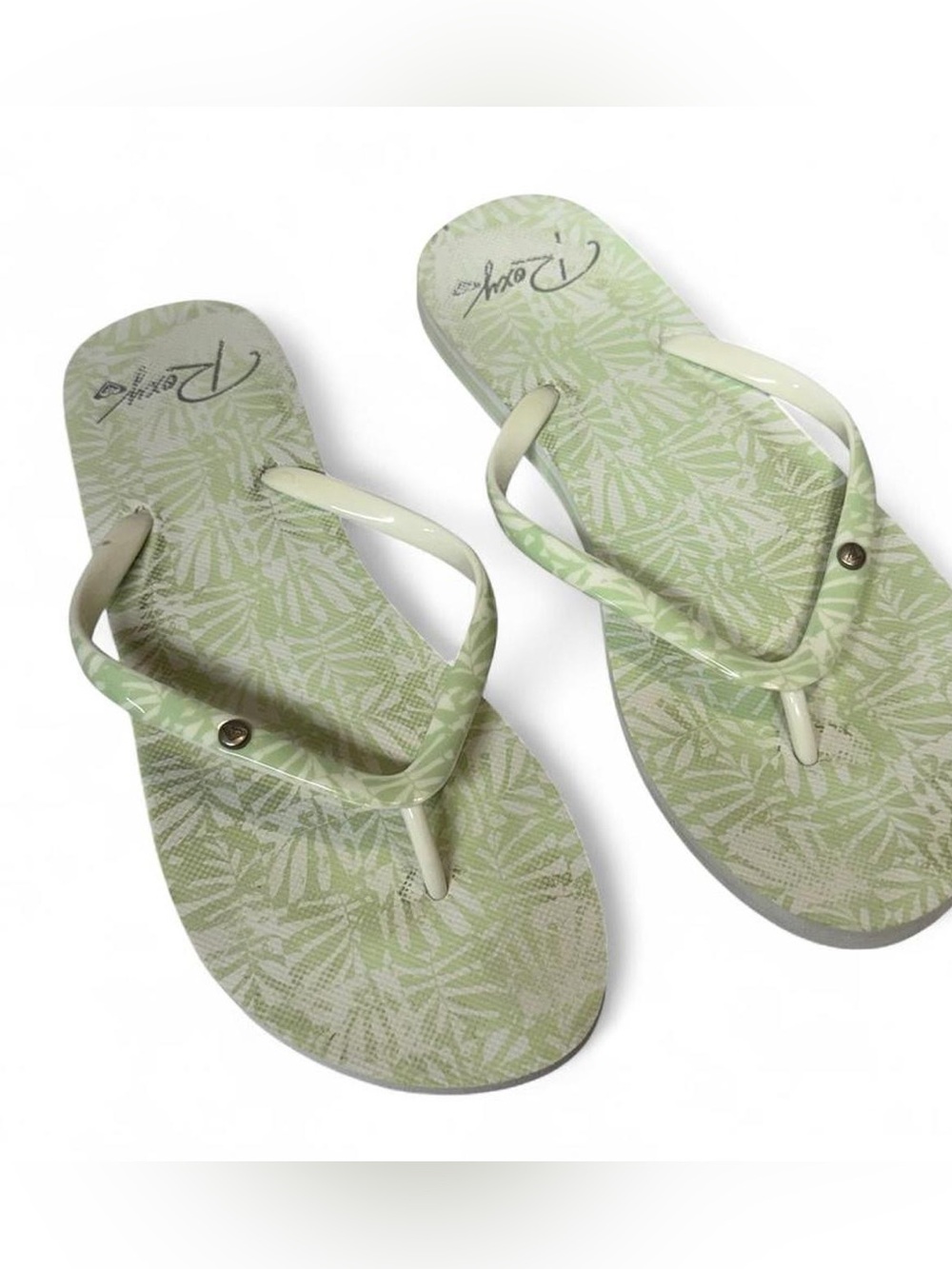 Light Green and White Roxy Patterned Flip Flops, size 9.